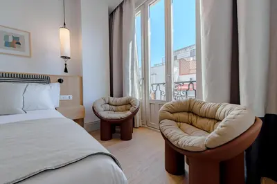 Cama o camas de una habitación en Apartamentos Soho Boutique Hoy No Me Puedo Levantar