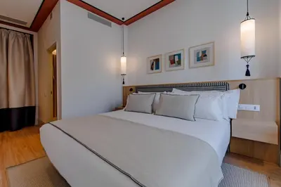 Cama o camas de una habitación en Apartamentos Soho Boutique Hoy No Me Puedo Levantar