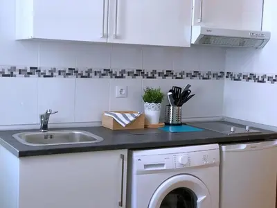 Una cocina o zona de cocina en Apartamentos TravelStep La Latina