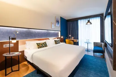 Cama o camas de una habitación en Crowne Plaza Madrid - Centre Retiro by IHG