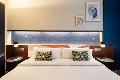 Cama o camas de una habitación en Crowne Plaza Madrid - Centre Retiro by IHG