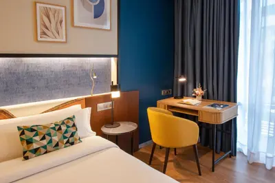 Cama o camas de una habitación en Crowne Plaza Madrid - Centre Retiro by IHG