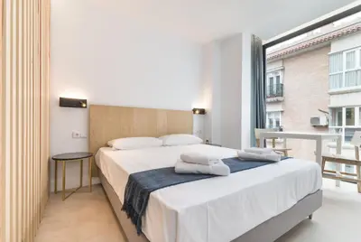 Cama o camas de una habitación en Stayaday Apartments Albufera
