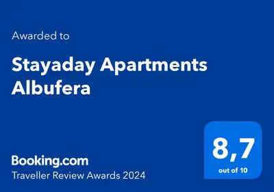 Certificado, premio, señal o documento que está expuesto en Stayaday Apartments Albufera