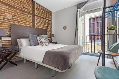 Cama o camas de una habitación en DOWNTOWN La LATINA Grupos, by MONARO*****