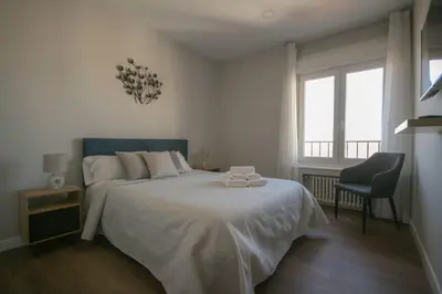 Cama o camas de una habitación en Apartamento con Terraza al Palacio Real