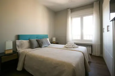 Cama o camas de una habitación en Apartamento con Terraza al Palacio Real
