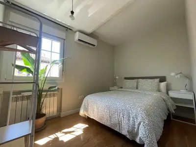 Cama o camas de una habitación en Rooms Pilarica