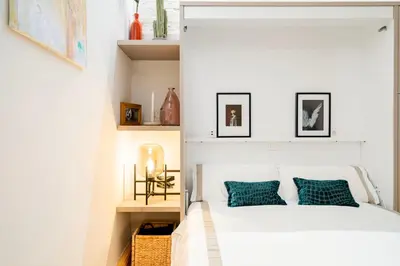 Cama o camas de una habitación en New Best location in central Madrid Loft