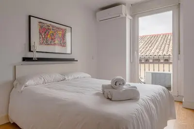 Cama o camas de una habitación en Studio La Latina by SharingCo