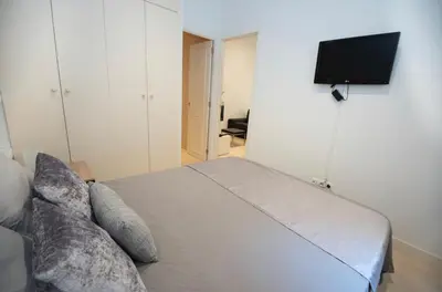 Una televisión o centro de entretenimiento en Relax home