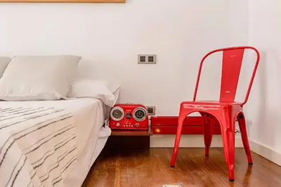 Cama o camas de una habitación en Heima Wonderful Loft in the Historic City Center