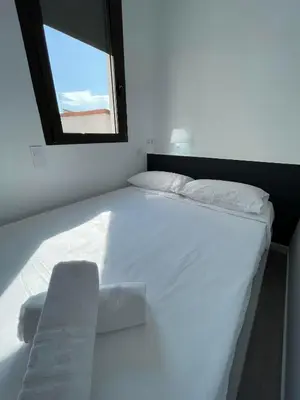 Cama o camas de una habitación en Atocha habitaciones