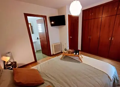 Cama o camas de una habitación en Posada Madrileña