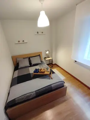 Cama o camas de una habitación en Posada Madrileña