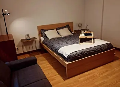 Cama o camas de una habitación en Posada Madrileña