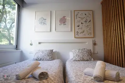 Cama o camas de una habitación en Almagro Apartments