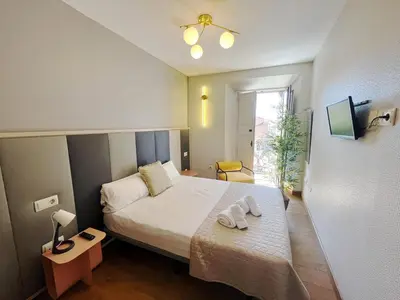 Cama o camas de una habitación en Aparthotel ARDMADRID Centro