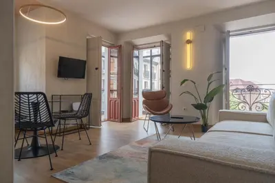 Una televisión o centro de entretenimiento en Aparthotel ARDMADRID Centro