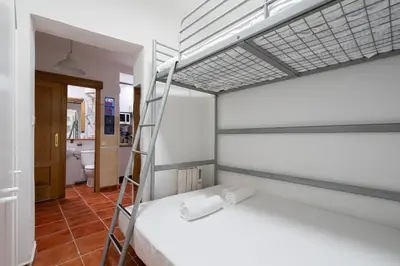 Cama o camas de una habitación en Cómodo apartamento en el centro de Madrid