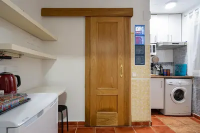 Una cocina o zona de cocina en Cómodo apartamento en el centro de Madrid