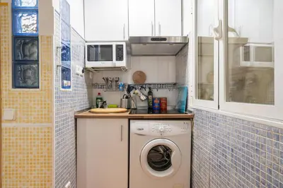 Una cocina o zona de cocina en Cómodo apartamento en el centro de Madrid