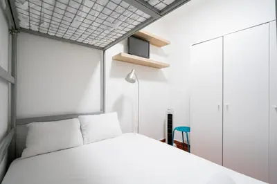 Cama o camas de una habitación en Cómodo apartamento en el centro de Madrid