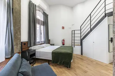 Cama o camas de una habitación en VR OBREGON APARTMENTS