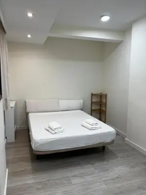 Cama o camas de una habitación en Exyca Barrio Salamanca