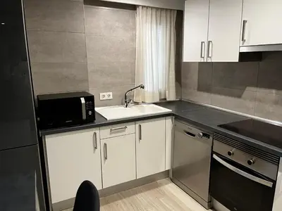 Una cocina o zona de cocina en Exyca Barrio Salamanca