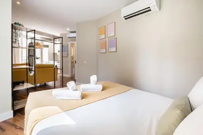 Cama o camas de una habitación en Apartamentos Cruz
