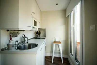 Una cocina o zona de cocina en Apartamentos Cruz