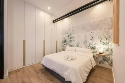Cama o camas de una habitación en MyHouseSpain - Acogedor piso cerca de Atocha I