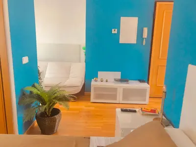 Zona de estar de PENTHOUSE INDEPENDIENTE a 3 paradas en metro de ATOCHA (estacion central Madrid)