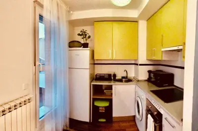 Una cocina o zona de cocina en PENTHOUSE INDEPENDIENTE a 3 paradas en metro de ATOCHA (estacion central Madrid)