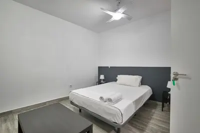 Cama o camas de una habitación en Núñez de Arce habitaciones