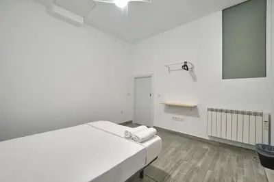 Cama o camas de una habitación en Núñez de Arce habitaciones