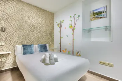 Cama o camas de una habitación en Madrid Ferrocarril - Apartamento de 2 dormitorios