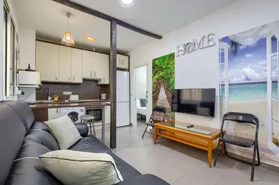 Una televisión o centro de entretenimiento en Madrid Ferrocarril - Apartamento de 2 dormitorios