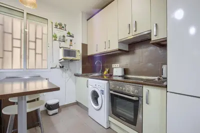 Una cocina o zona de cocina en Madrid Ferrocarril - Apartamento de 2 dormitorios