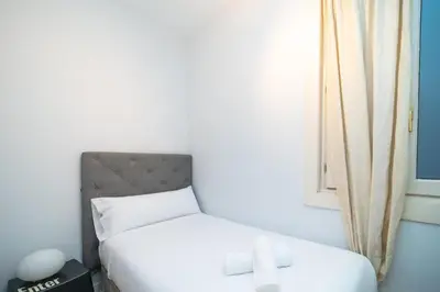Cama o camas de una habitación en GuestReady - Cozy stay in the Heart of Madrid