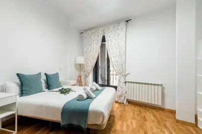 Cama o camas de una habitación en Plaza Mayor II - Apartamento de 2 dormitorios