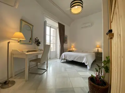 Cama o camas de una habitación en Elegant full apartment overlooking Plaza Mayor