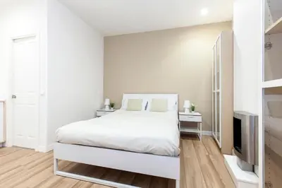 Cama o camas de una habitación en Gran Vía Luna - 5 dormitorios en el Centro