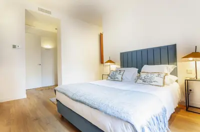 Cama o camas de una habitación en Cibeles Exclusive en Madrid
