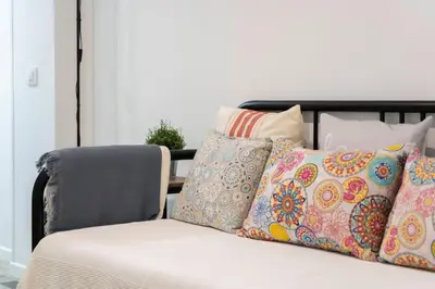 Cama o camas de una habitación en Beautiful flat in Lavapiés-Embajadores