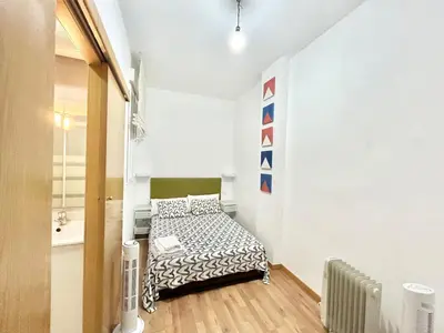Cama o camas de una habitación en Atocha Ferrocarril 5
