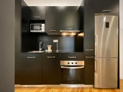 Una cocina o zona de cocina en Puerta de Toledo III - Apartamento de 1 dormitorio