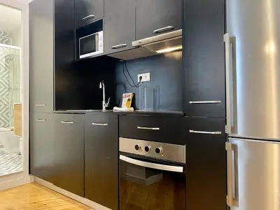 Una cocina o zona de cocina en Puerta de Toledo III - Apartamento de 1 dormitorio