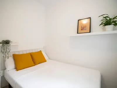 Cama o camas de una habitación en 2 bedroom flat in La Latina-CARN